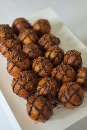 Chocolate drizzled Puff-Puff